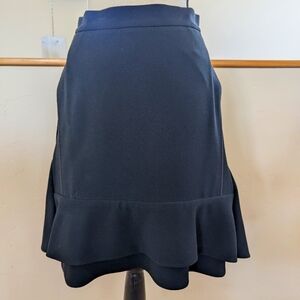 Celine black knee length skirt with silk piping and side pockets size FR38, US6